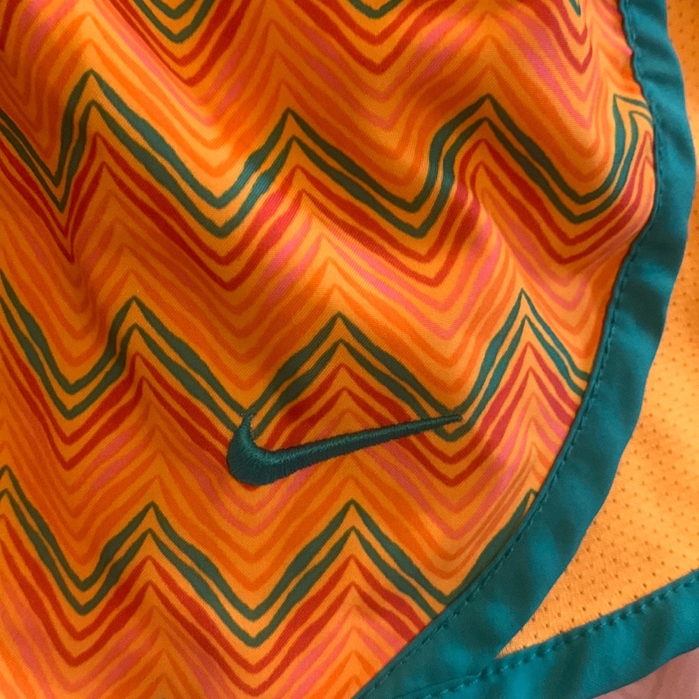 orange nike shorts